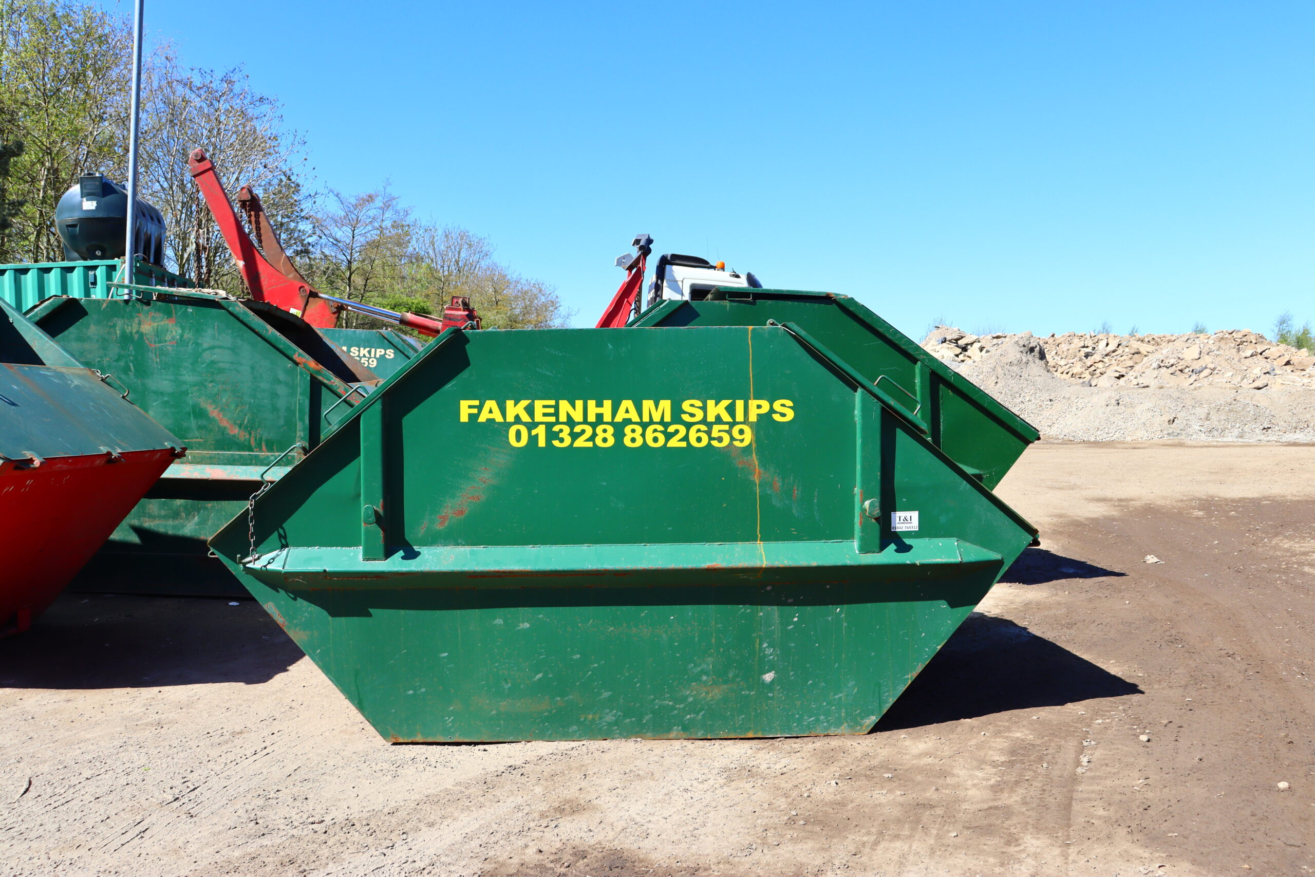 Fakenham branded skip on site